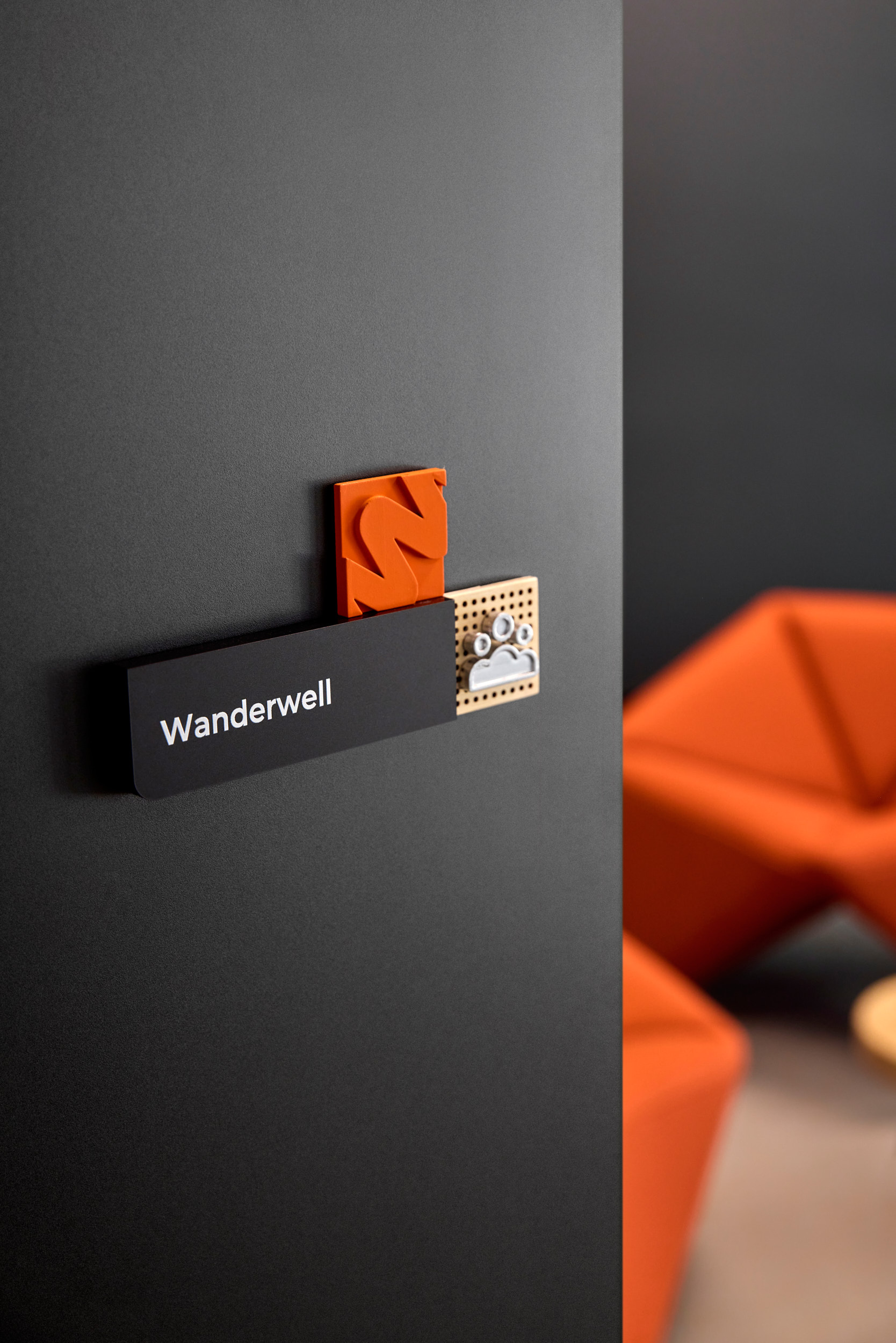 Detail on the meeting room sign at Autodoc office
